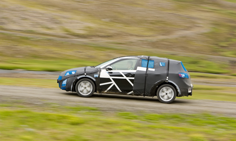 Illustration for article titled 2010 Mazda3 Hatchback Spied By Mazda